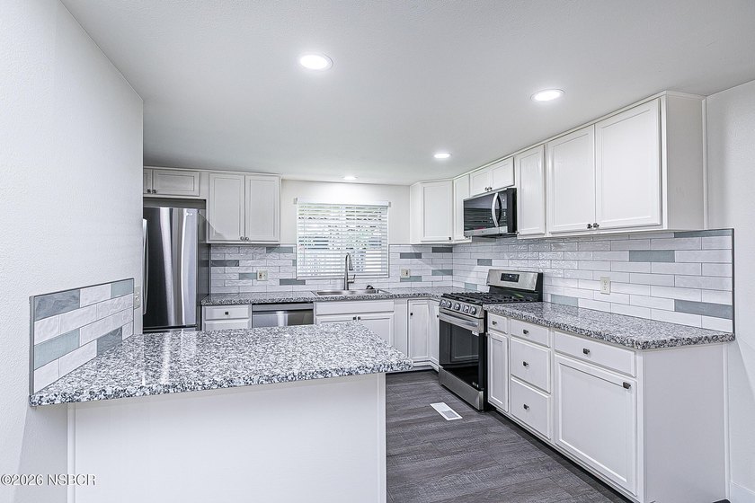SEEING IS BELIEVING !! This MASTERFUL REMODEL creates an - photo 14