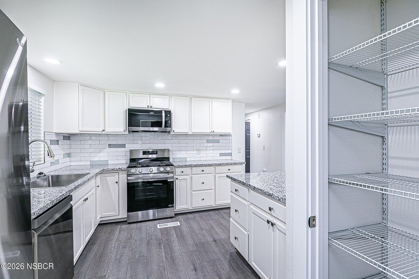 SEEING IS BELIEVING !! This MASTERFUL REMODEL creates an - photo 15