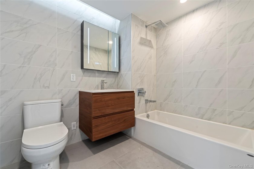 This thoughtfully designed 2-bedroom, 2-bath residence offers - photo 8