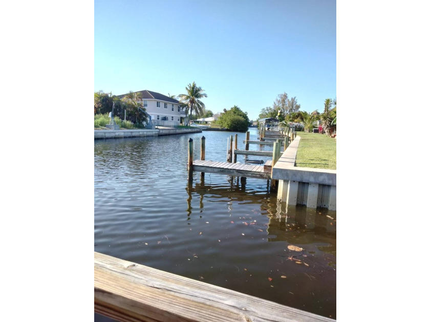 Canal Access!! This home has been beautifully remodeled from the - photo 22