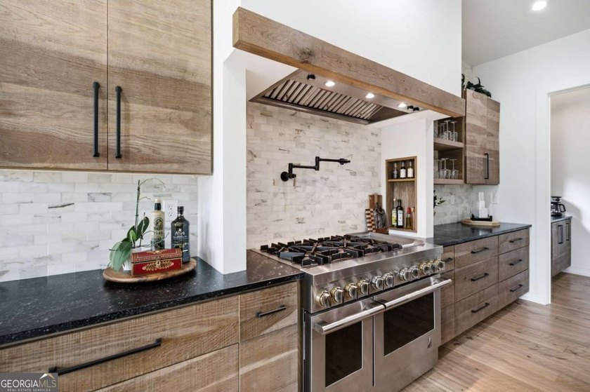 Old World Charm, Modern Lakefront Living. Welcome home where - photo 24