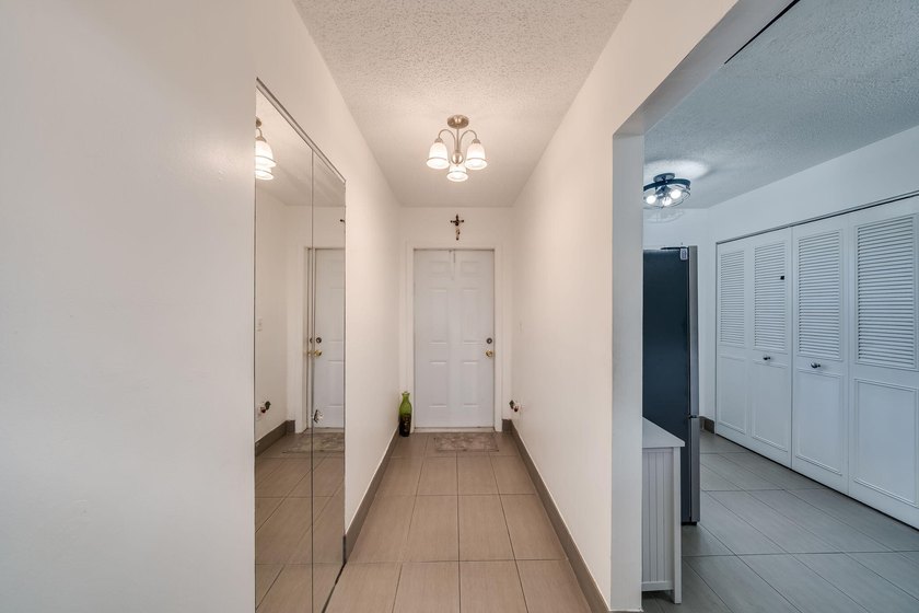2/2 remodeled 55+ plus community. White Kitchen, New Tile, Wood - photo 5