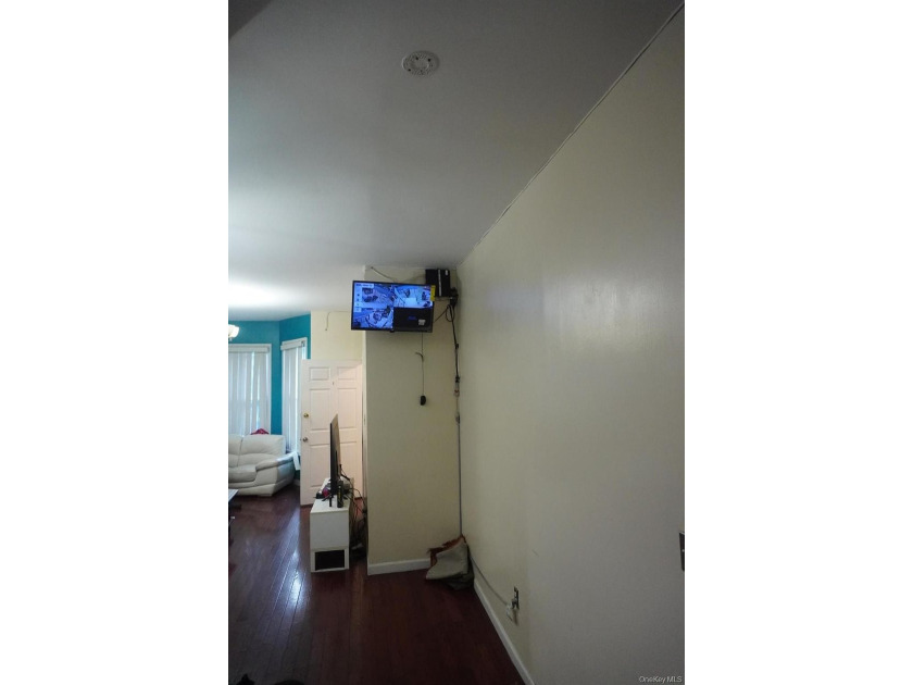 Charming and well-maintained two-family frame house featuring a - photo 3