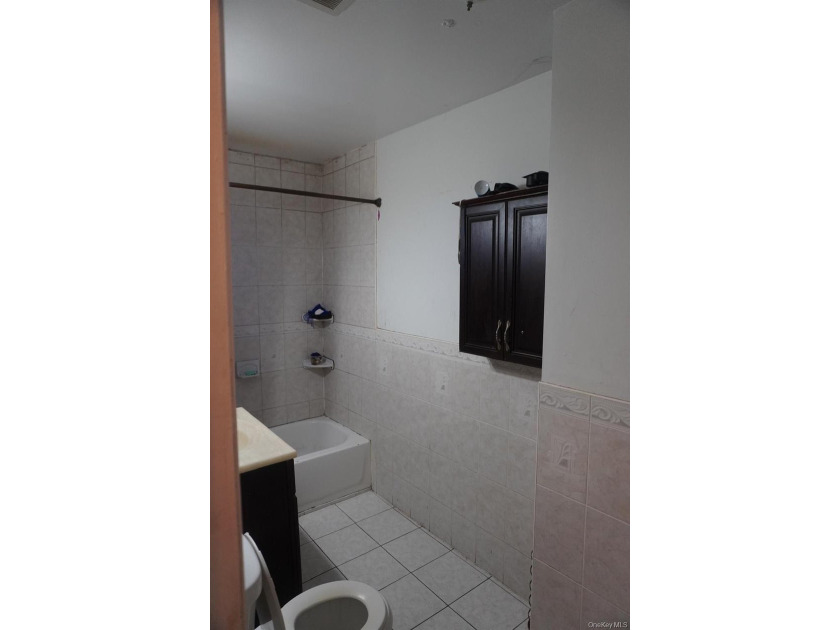 Charming and well-maintained two-family frame house featuring a - photo 6