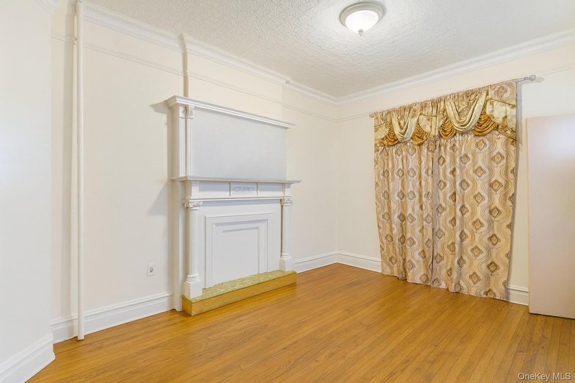 Exceptional brownstone six-unit multi-family building offering a - photo 7