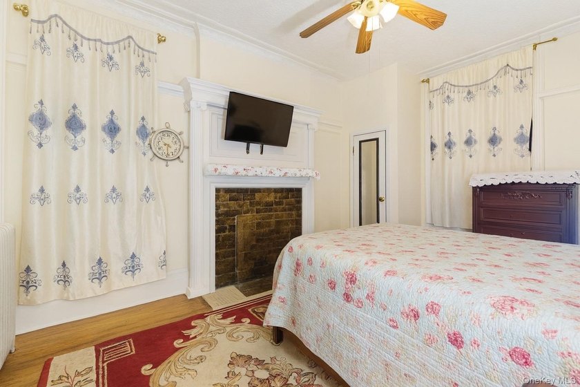 Exceptional brownstone six-unit multi-family building offering a - photo 9