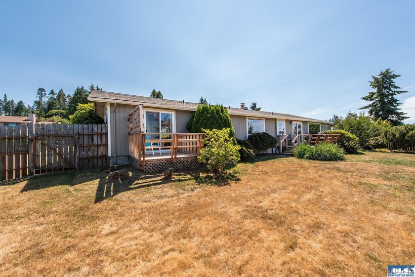 Perched above Sequim, this beautifully updated 3-bedroom, 2-bath - photo 37