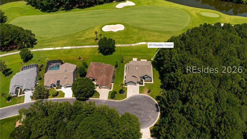 Tucked on a private cul-de-sac wooded lot, this reimagined Del - photo 2