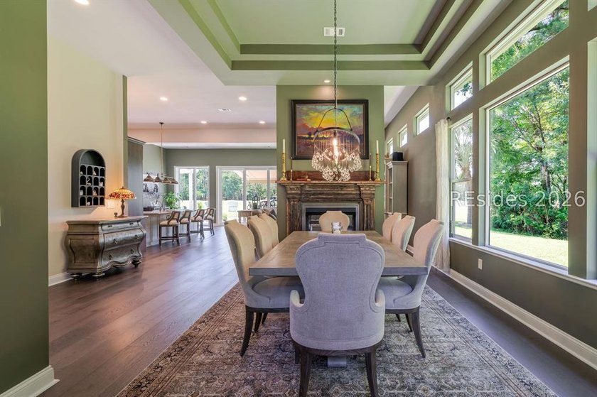 Tucked on a private cul-de-sac wooded lot, this reimagined Del - photo 6