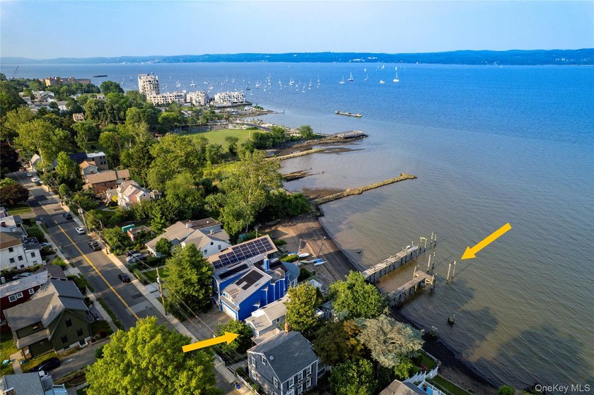 Experience the best of riverfront living in this charming - photo 2