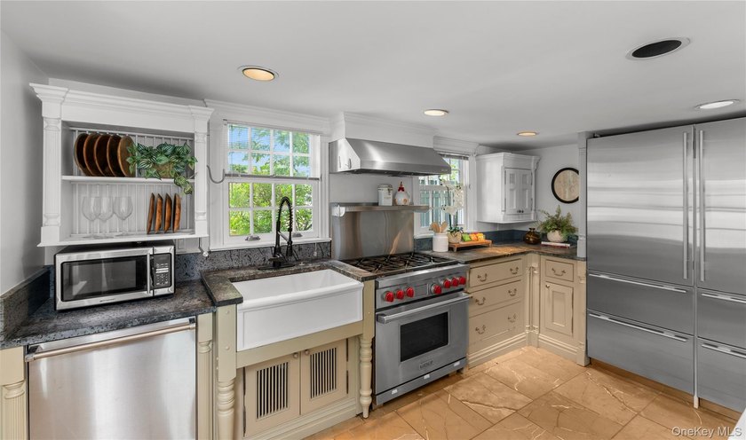Experience the best of riverfront living in this charming - photo 9
