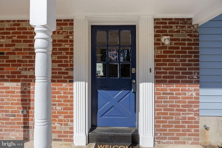 Welcome to this spacious 5-bedroom, 2.5-bath home nestled in the - photo 4