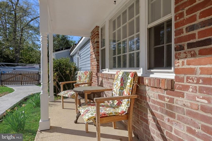 Welcome to this spacious 5-bedroom, 2.5-bath home nestled in the - photo 5