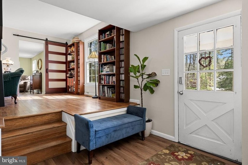 Welcome to this spacious 5-bedroom, 2.5-bath home nestled in the - photo 6