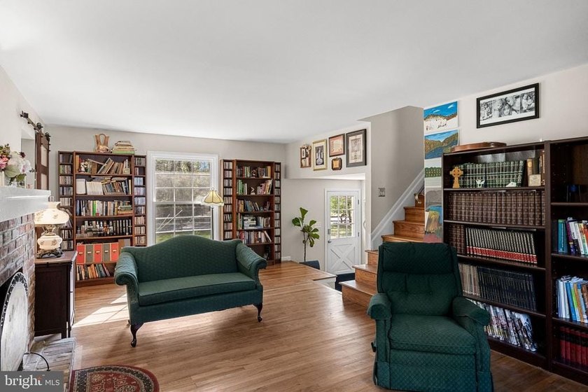 Welcome to this spacious 5-bedroom, 2.5-bath home nestled in the - photo 9
