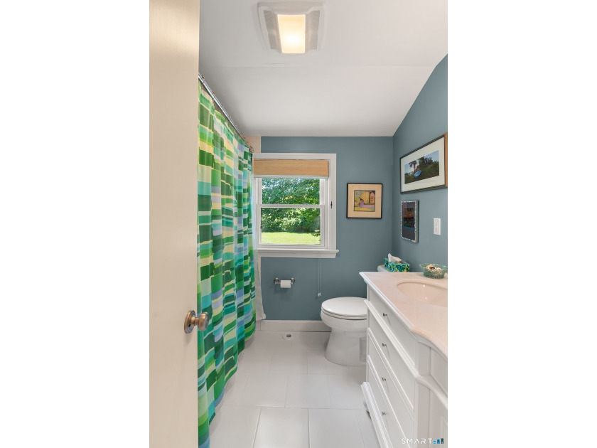 This classic New England Cape Cod is nestled just a short walk - photo 28