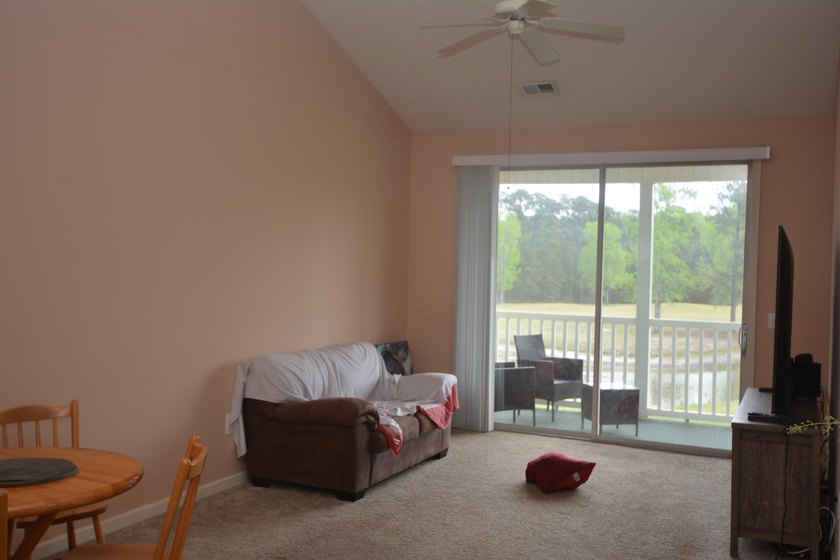 Nice 2 bedroom 2 bath unit updated 2 years ago with new carpet - photo 5