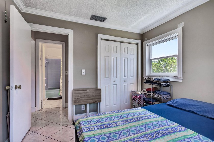 IMPACT WINDOWS- BRAND NEW KITCHEN! Welcome to this spacious and - photo 18