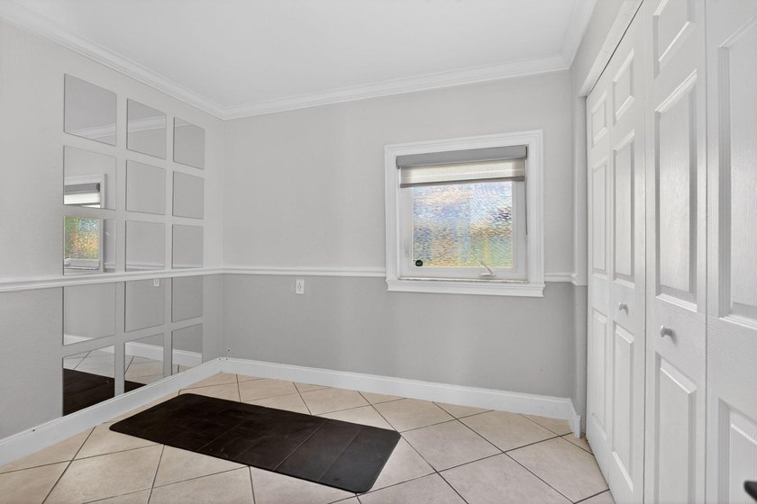 IMPACT WINDOWS- BRAND NEW KITCHEN! Welcome to this spacious and - photo 20