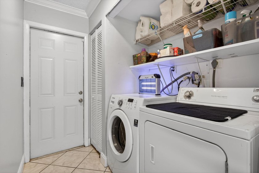 IMPACT WINDOWS- BRAND NEW KITCHEN! Welcome to this spacious and - photo 24