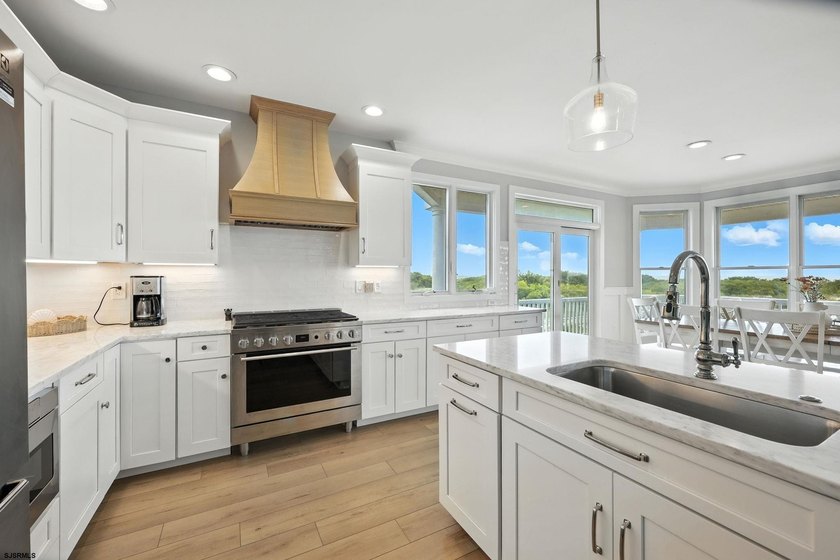 Stunning first-floor beachfront condo ideally positioned on a - photo 4