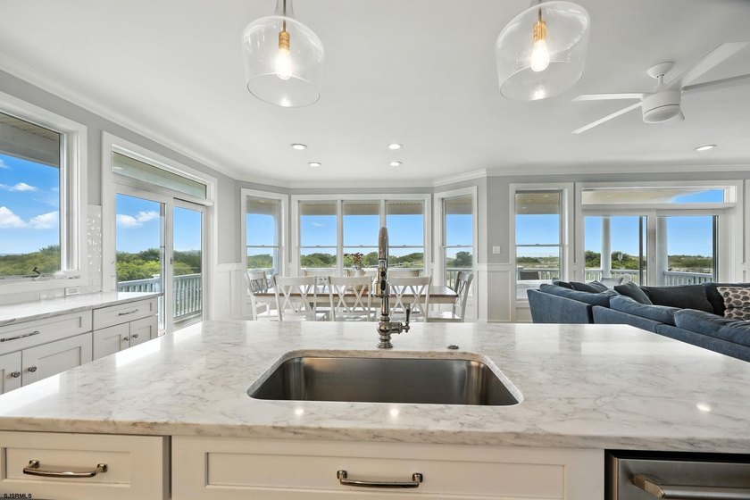 Stunning first-floor beachfront condo ideally positioned on a - photo 7