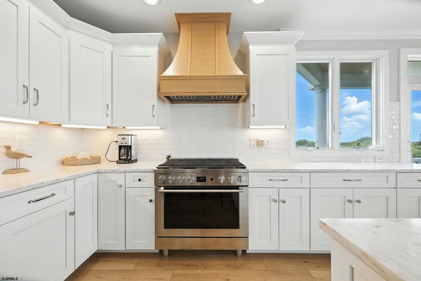 Stunning first-floor beachfront condo ideally positioned on a - photo 8