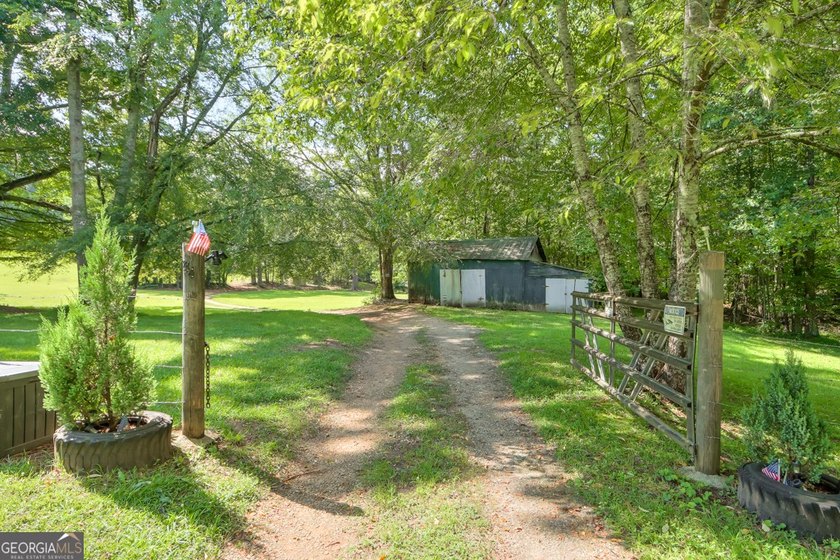 Zoned R-2, the property allows for one home per half-acre and - photo 11