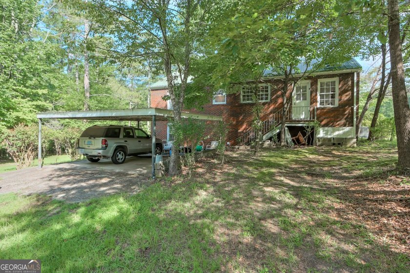 Zoned R-2, the property allows for one home per half-acre and - photo 13