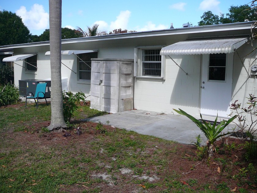 BEAUTIFUL 2/2 WITH CARPORT, CONCRETE BLOCK, NEW METAL ROOF AND - photo 8