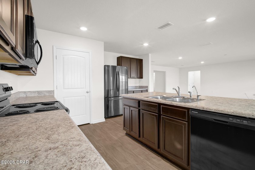 Located in Magnolia Hills, this open concept home centers around - photo 11