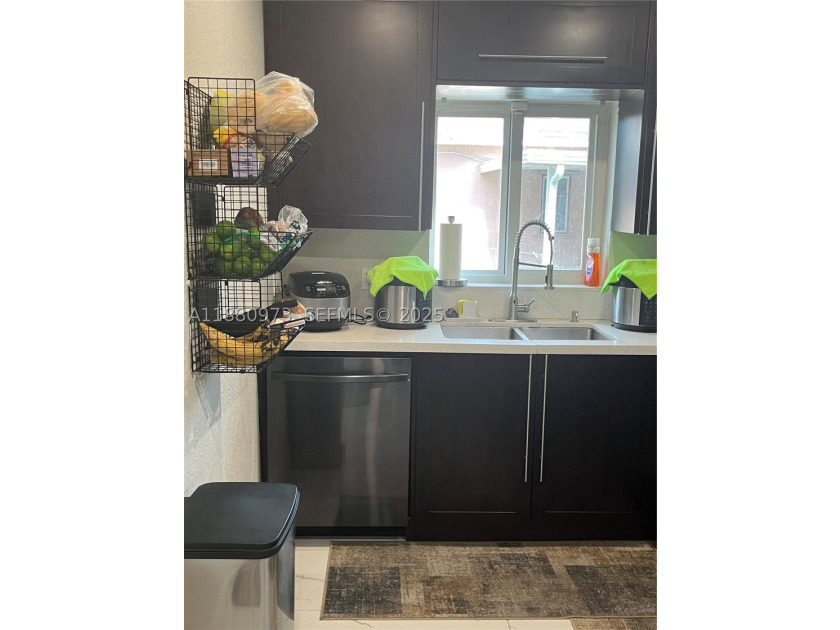 Welcome to this beautifully remodeled 6-bedroom 3 bath home!. An - photo 11