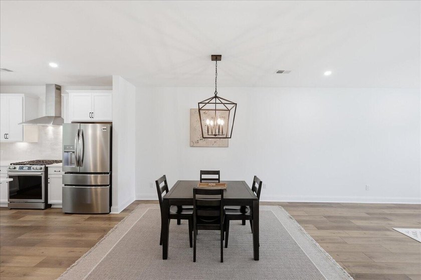 Luxury living meets walkable Lowcountry charm in this stunning - photo 13