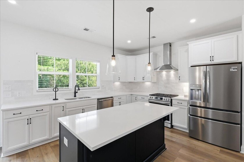 Luxury living meets walkable Lowcountry charm in this stunning - photo 21