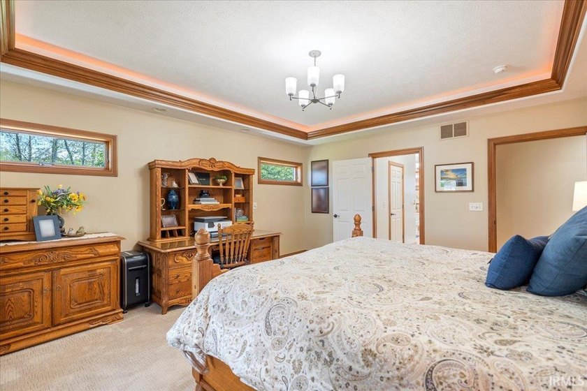 Experience exceptional lakefront living in this custom-built - photo 15