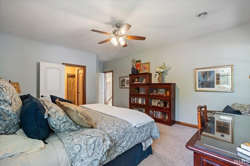 Experience exceptional lakefront living in this custom-built - photo 23