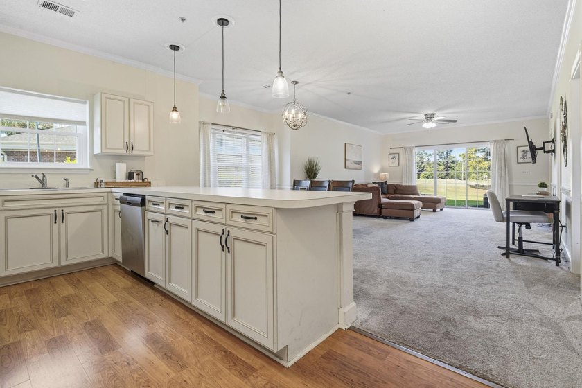 Welcome to this beautiful first-floor end-unit condo in the - photo 4
