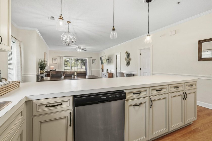 Welcome to this beautiful first-floor end-unit condo in the - photo 10