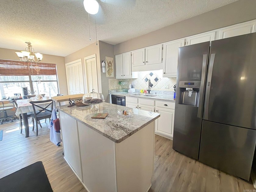 Lake-view home with so much to offer. This 3-bedroom, 2 bath - photo 5