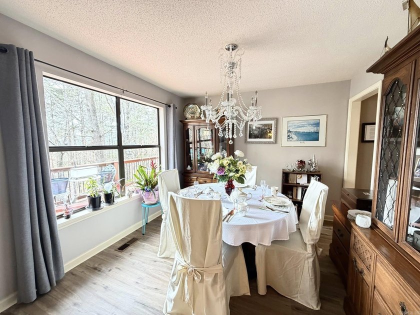 Lake-view home with so much to offer. This 3-bedroom, 2 bath - photo 8