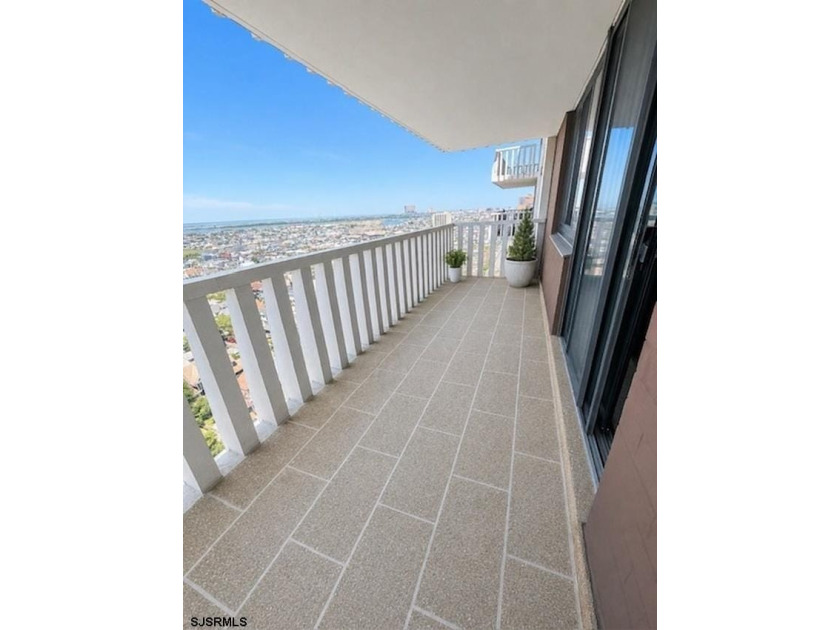Take in panoramic views of the beach and bay from this 21st fl - photo 10