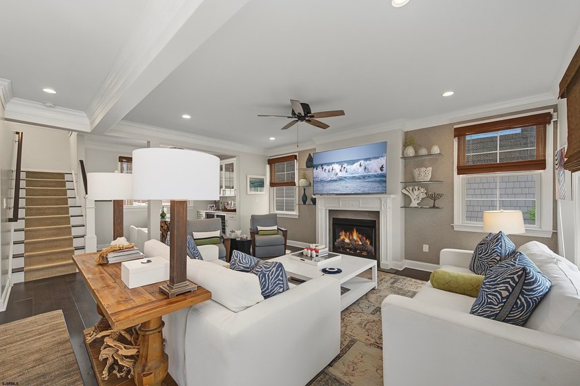 JUST FOUR HOMES FROM THE BEACH! Welcome to one of the most - photo 7