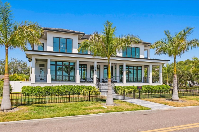 Nestled along the picturesque Coffee Pot Bayou, this luxurious - photo 2