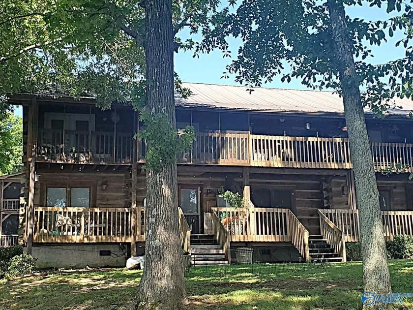 Enjoy lakeside living in this cozy yet upgraded 2nd-story log - photo 5