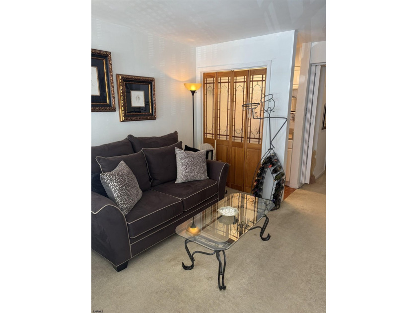 Welcome to Unit 106 at 132 S. Providence Avenue, a charming and - photo 4