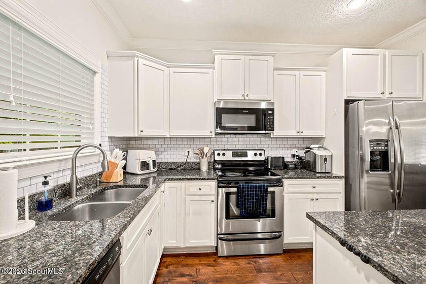 Nestled on a quiet street in the desirable mid-north area of St - photo 12