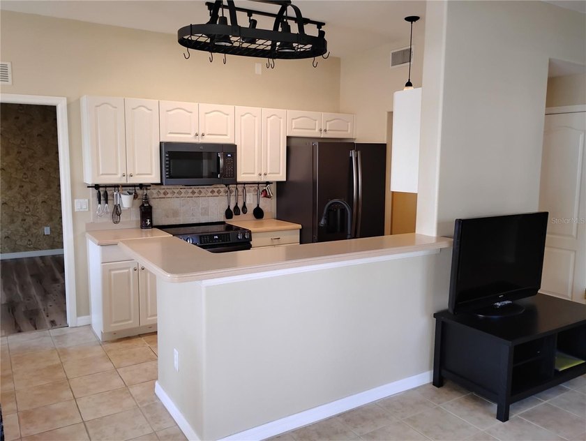 WOW!! Check out this beautiful first floor end unit Condo with - photo 19