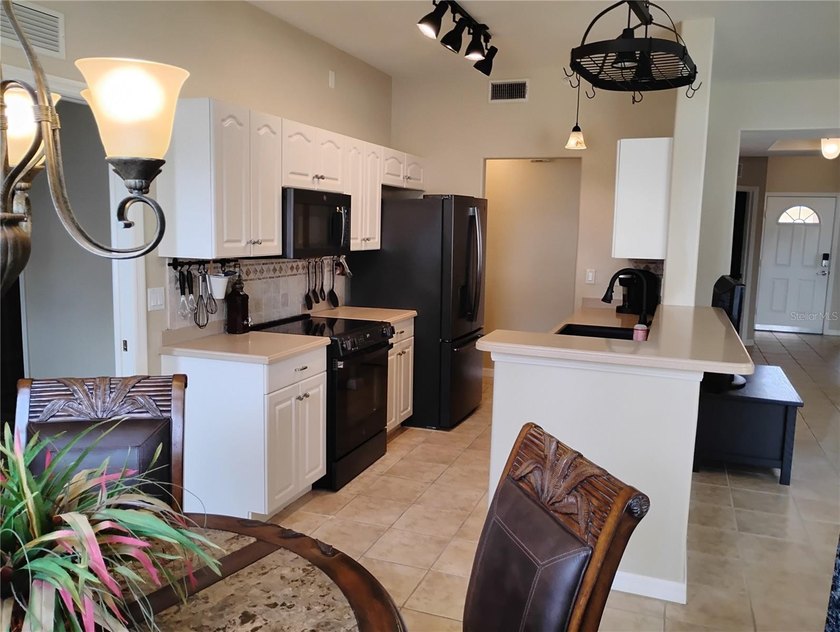 WOW!! Check out this beautiful first floor end unit Condo with - photo 27