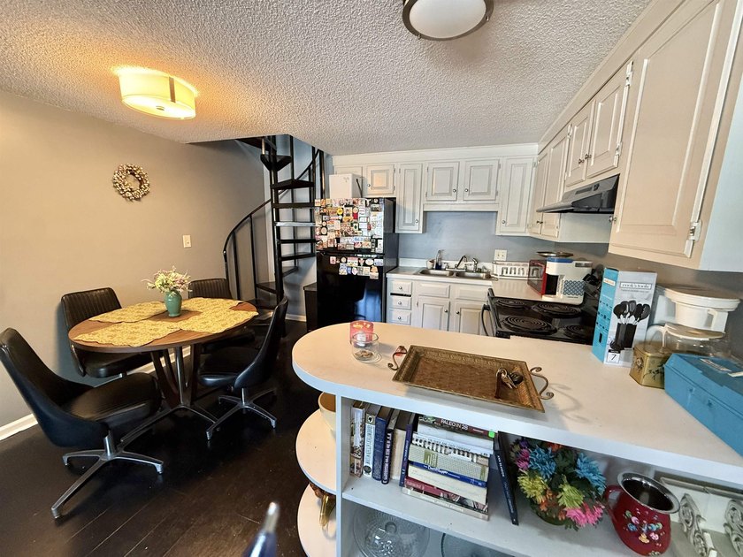 This charming 2 bedroom, 2 bath condo offers a unique and - photo 3