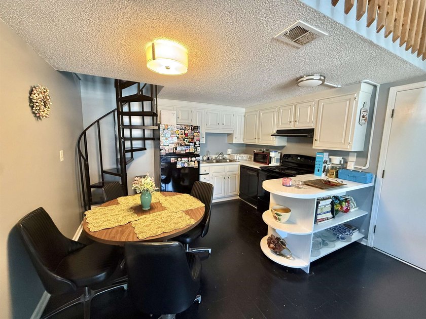 This charming 2 bedroom, 2 bath condo offers a unique and - photo 4